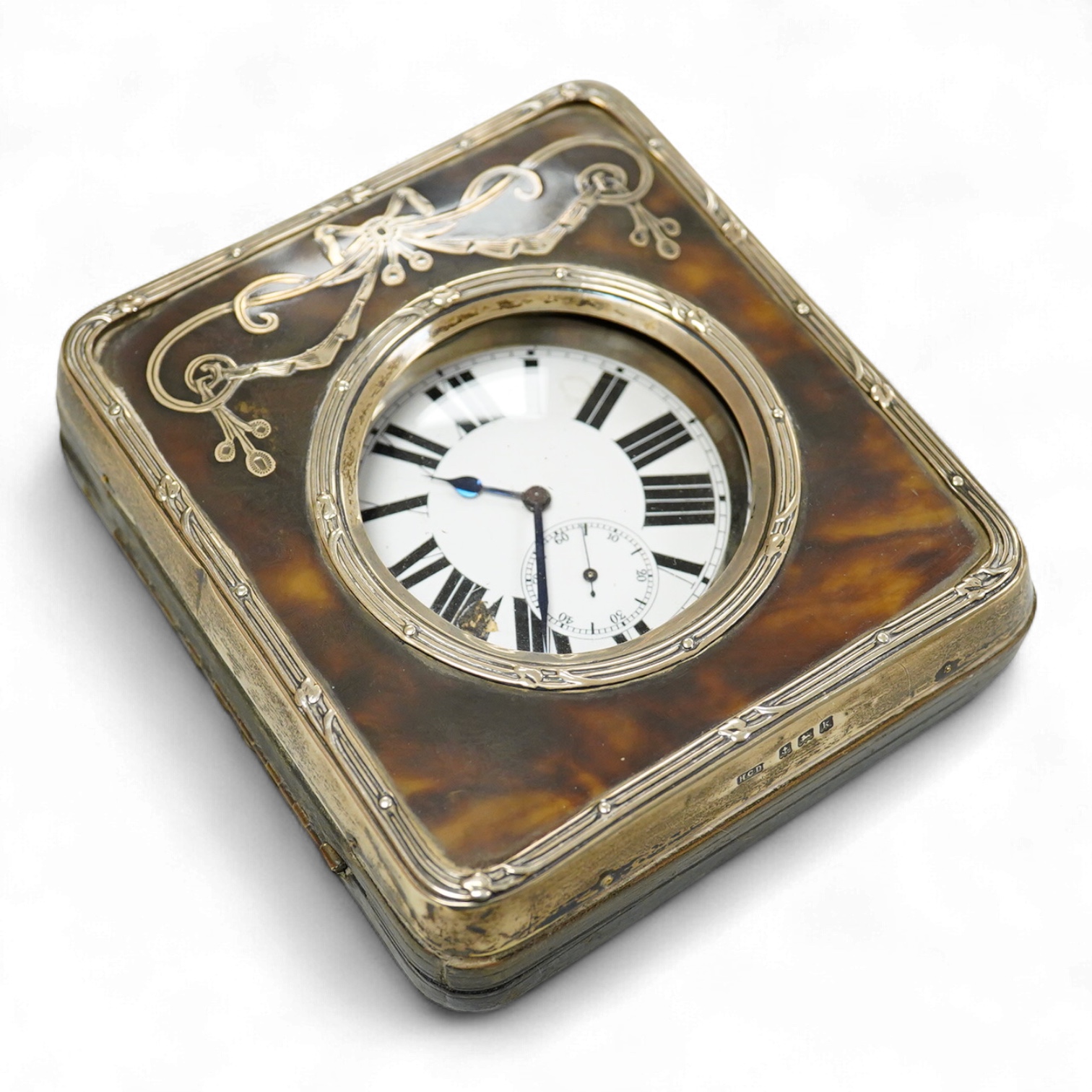 An Edwardian silver and pique inlaid tortoiseshell pocket watch case, Henry Clifford Davis, Birmingham 1909, 11.3cm, containing keyless pocket watch.